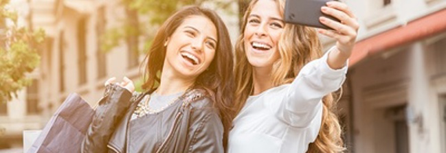 Women taking a selfie Image